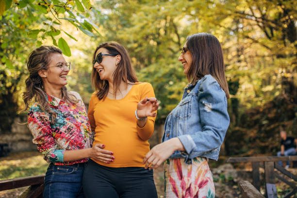 istock Three women in park 1183352248