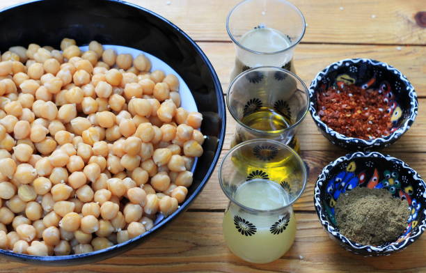 istock Ingredients for hummus from chickpea with tahine 1183356077
