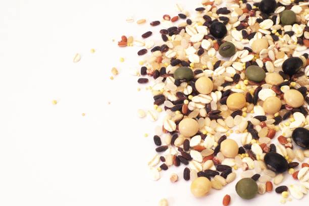 istock Cereals and beans on white background 1183359382