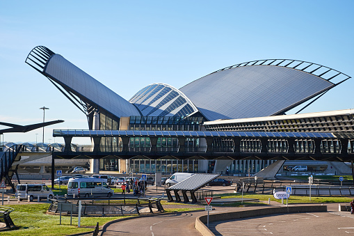 Lyon, France - March 16, 2019: Back view of TGV station main building at Lyon Saint-Exupery Airport, designed by architect Santiago Calatrava Valls. The design resembles a bird in flight.