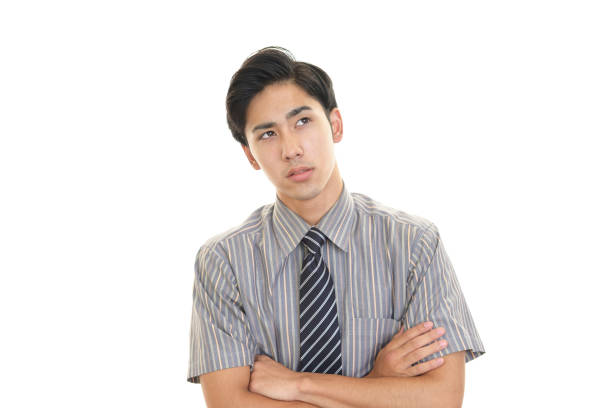 istock Uneasy Asian businessman 1183359851