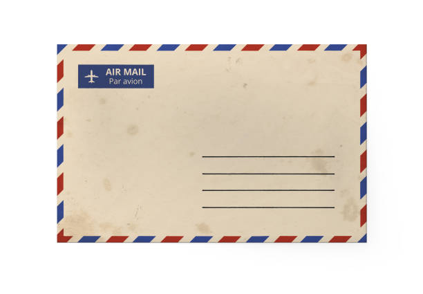 istock Old yellow envelope for letter - American Air Mail style with blue and red border. Front side of envelope. 1183363617