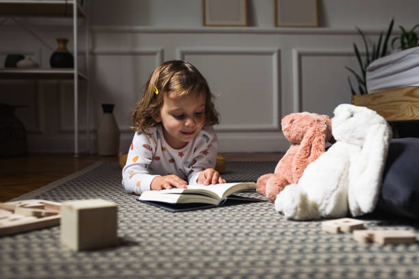 Little Girl Reading a Book