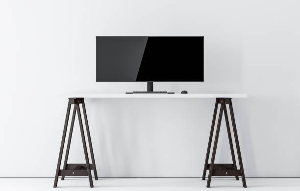 istock Ultra Wide Computer Monitor  mock up on white table in white empty room 1183365120