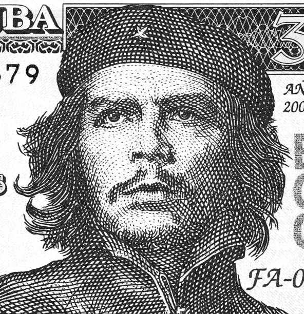 Ernesto Che Guevara's photo on currency Ernesto Che Guevara on 3 Pesos 2004 Banknote from Cuba. An inspiration for every human being who loves freedom. argentinian ethnicity photos stock illustrations
