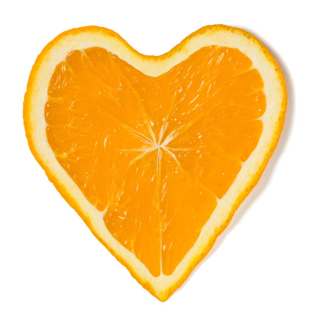 istock Fresh orange slice heart shape isolated on white background 1183369241