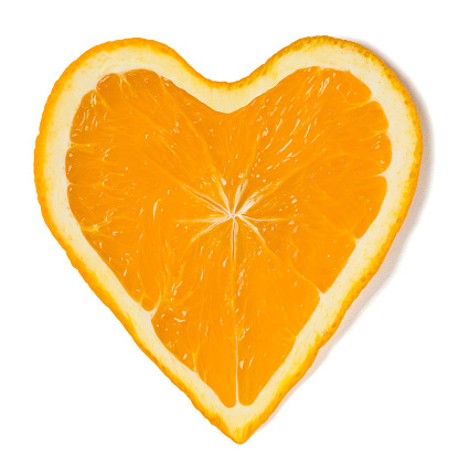 Fresh orange slice heart shape isolated on white background. Cut out