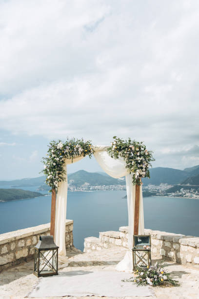 istock Beautiful wedding arch with flowers 1183369585