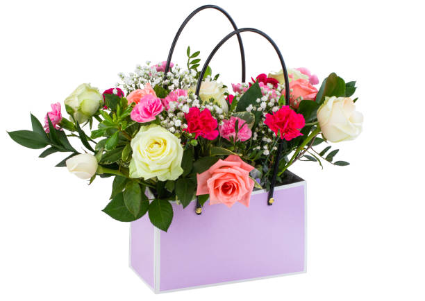 istock Gift box with beautiful flowers isolated on white background 1183373758