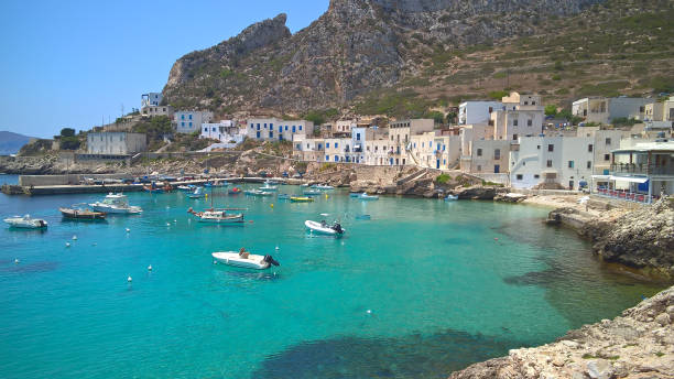 View of Levanzo's harbor island in the Mediterranean of Egadi Islands View of Levanzo island in the Mediterranean sea west of Sicily, Italy egadi islands photos stock pictures, royalty-free photos & images