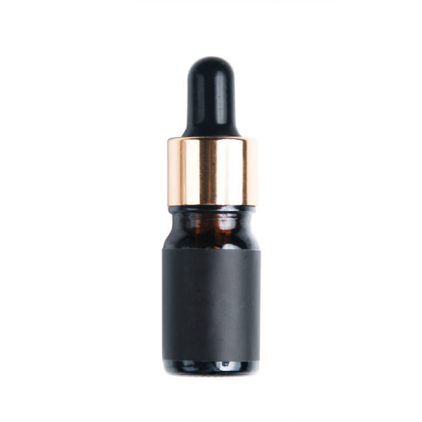 istock Jars for cosmetics on a white background. Oil and henna for eyebrows. 1183374583