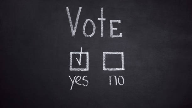 istock Yes answer marked in checklist written on blackboard, president election 1183376267