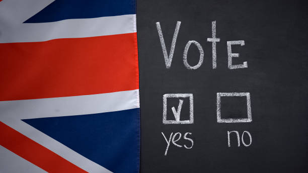 istock British flag on blackboard, yes answer marked in vote, historical quiz, election 1183376294
