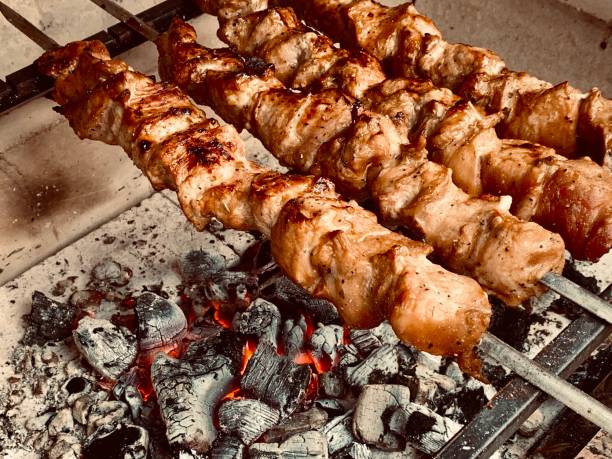 istock the process of cooking meat on the grill 1183376492
