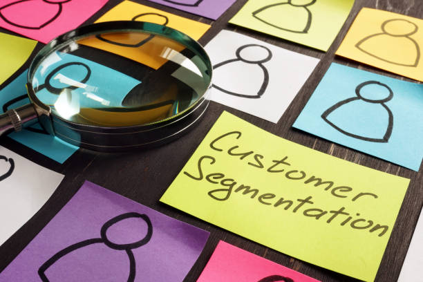 istock Customer Segmentation marketing concept. Magnifying glass and papers. 1183376551