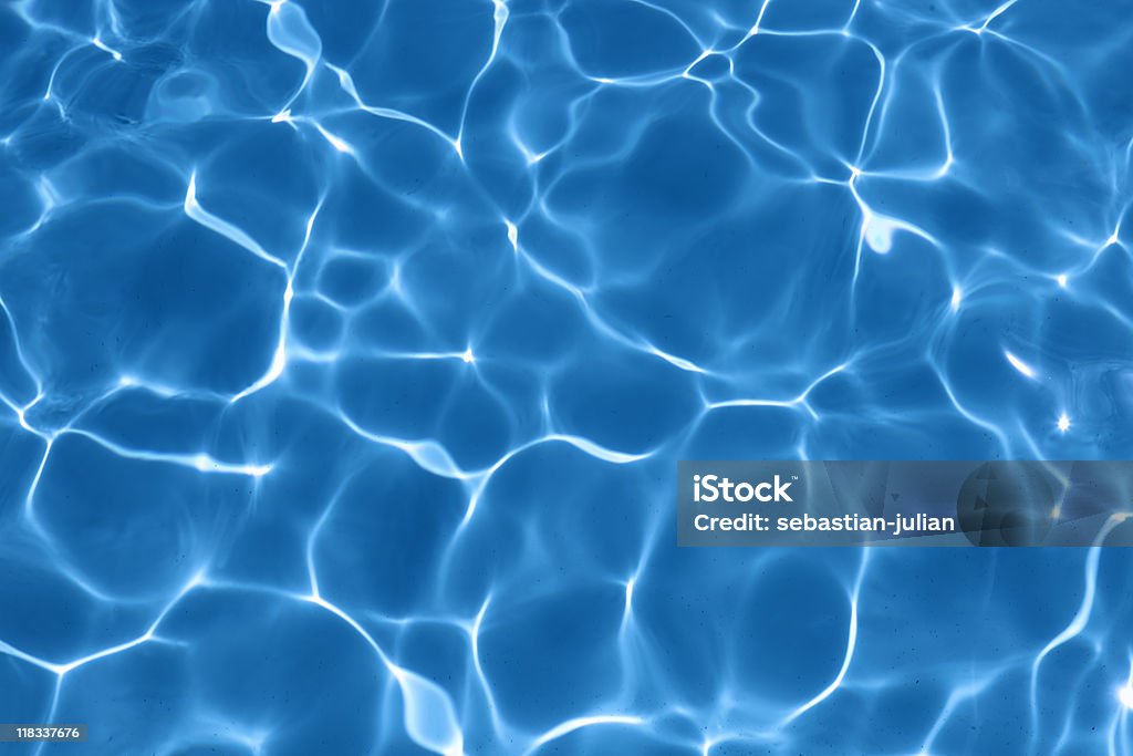water surface in vibrant blue  Water Stock Photo