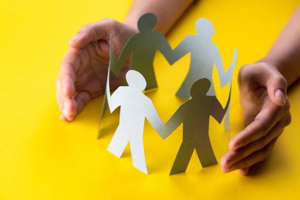 istock Hand Protecting Paper Cut Out Figure 1183381318