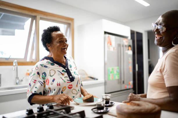 istock Senior friends having some cake in the kitchen 1183383339