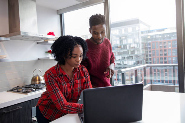 istock Couple With a Laptop 1183384736