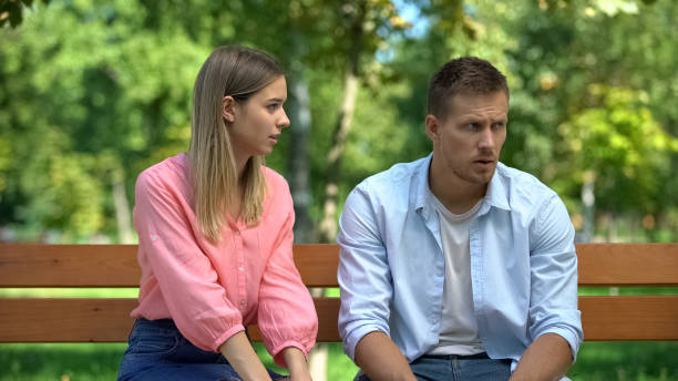 istock Female looking interest ignoring man, lack of attention, relations difficulties 1183389428