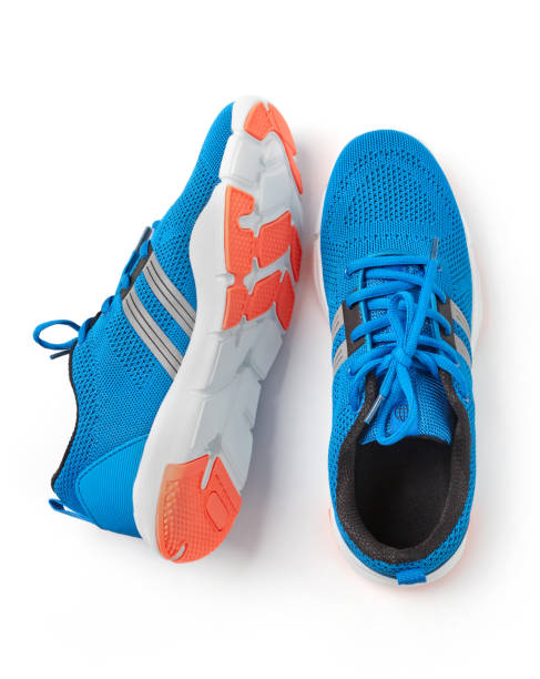 istock Blue running shoes on white background 1183390758