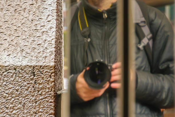 Adult Man Taking an Unusual Perspective Selfie