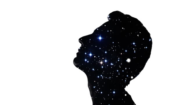 Double exposure: Man's face and stars