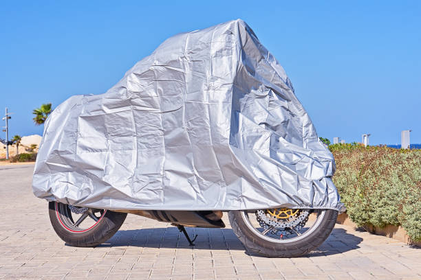 istock Waterproof cover for motorcycle with silver reflective surface 1183401720