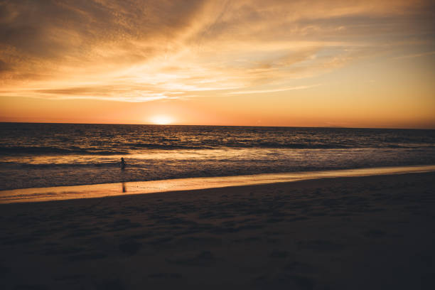 istock Sunset in Malibu Beach, USA 1183401752