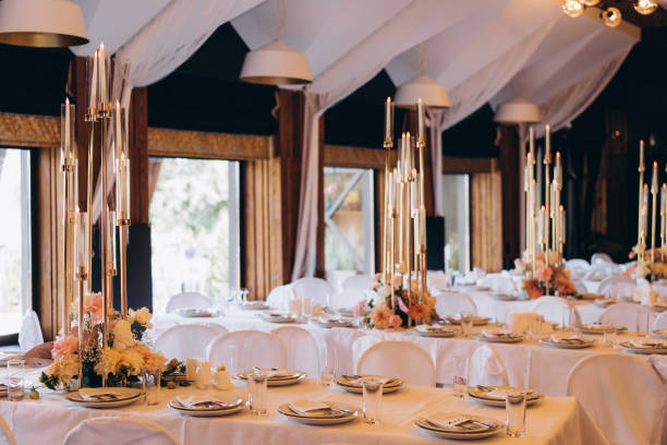 istock high decorative candles table decoration at a wedding 1183401782