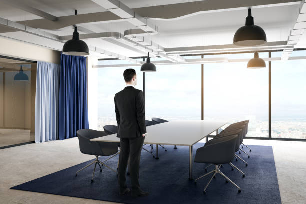 istock Businessman in modern conference room 1183406547