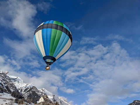 Balloons flying low overhead