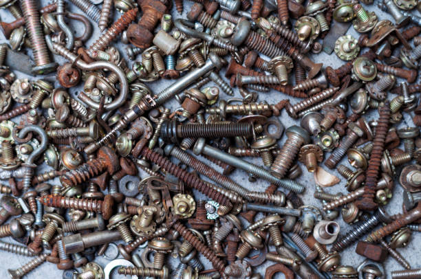 istock Screw-bolts and nuts background. 1183416415