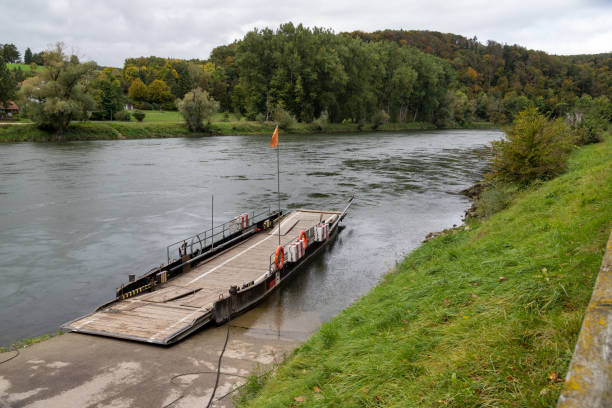 Ferry at Danube river breakthrough near monastery Weltenburg in Bavaria, Germany in autumn