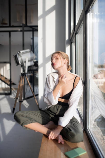 istock Woman feeling amazing while taking perfume in the morning 1183419056