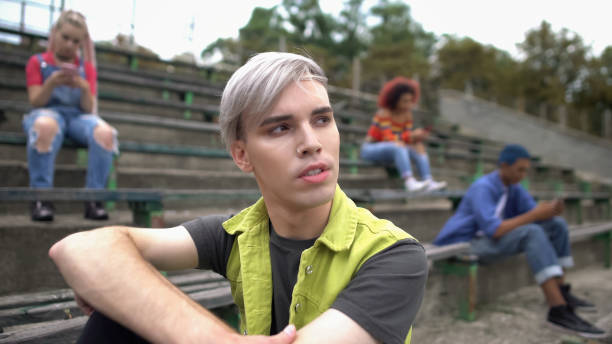 Modern male student looking away, stylish generation, personality expression