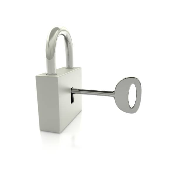 istock Steel lock with key on reflective floor. Isolated on white background 1183423926
