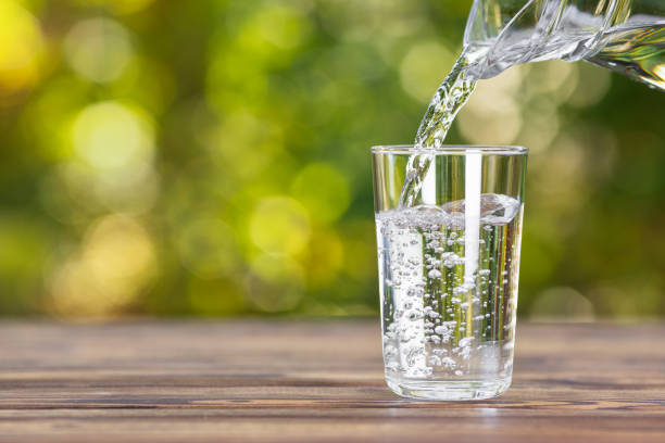 istock water pouring into glass 1183425034