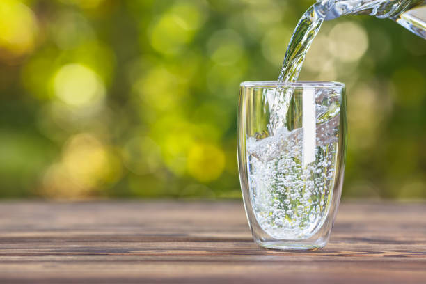 istock water pouring into glass 1183425052
