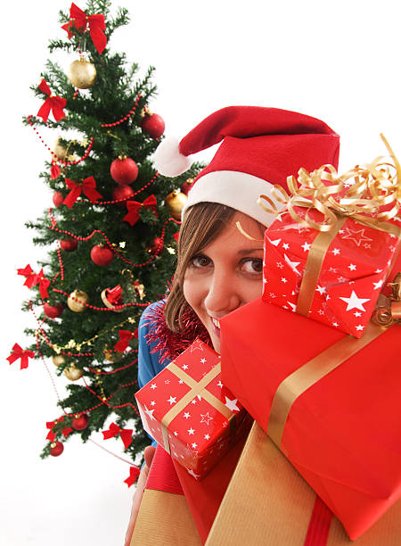 istock Woman, Christmas tree and presents 118342680