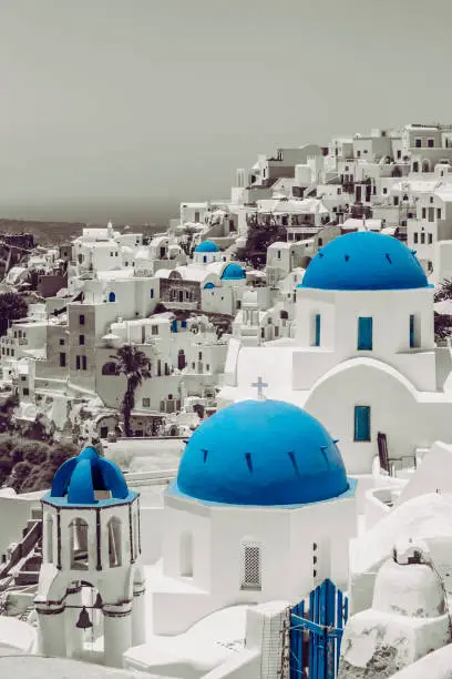 Photo of Popular blue dome and whitewashed churches on island of Santorini, Greece in Europe.