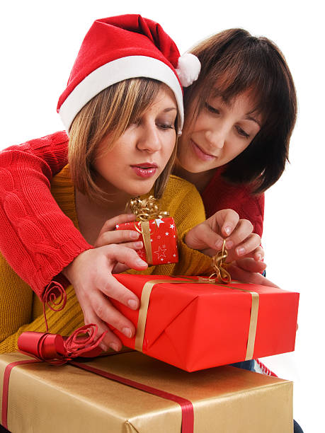 istock Women with Christmas presents 118342725