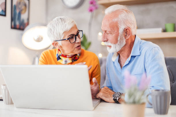 istock Senior couple shopping online. 1183427335