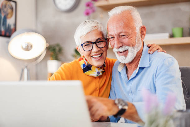 istock Senior couple shopping online. 1183428447