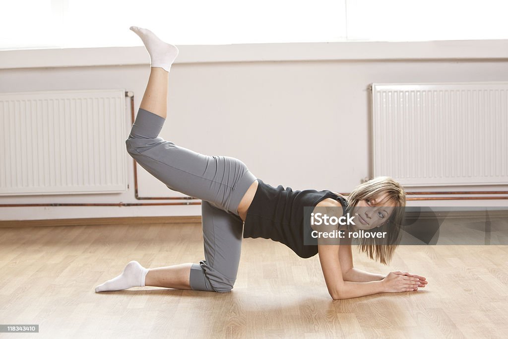 Woman stretching leg  Adult Stock Photo