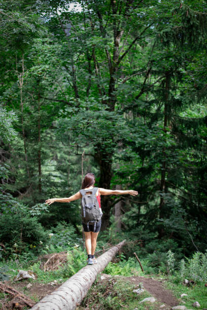 istock Balancing women in a forest 1183439515