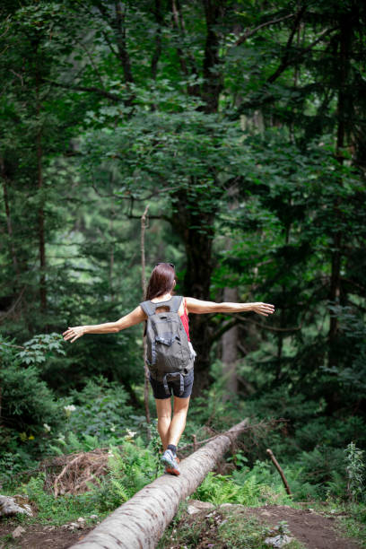istock Balancing women in a forest 1183439542