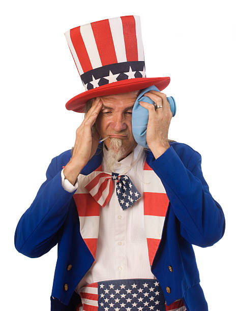 Santa Fe, NM - July 4, 2025: A senior Uncle Sam character chats with a friend in downtown Santa Fe on the Fourth of July.