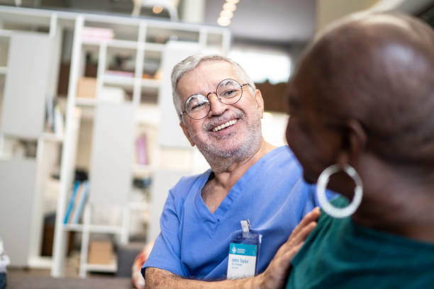istock Doctor and patient talking at home 1183441593