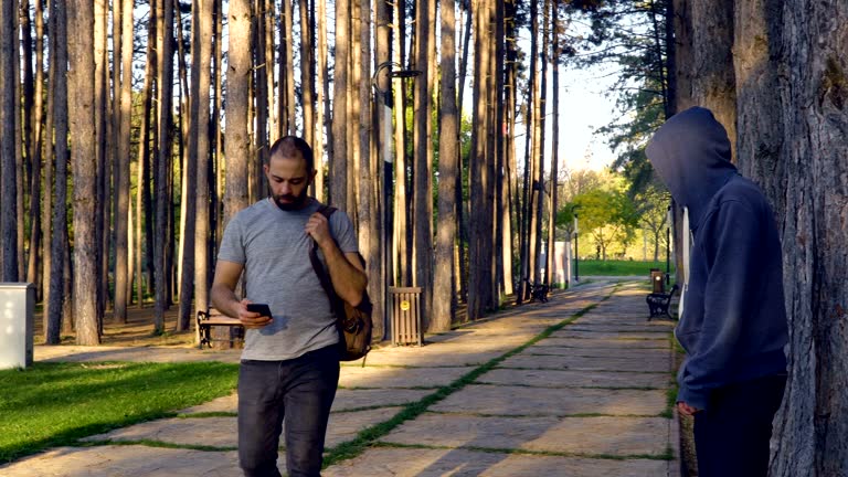 Man defending himself applying skill of martial arts in public park